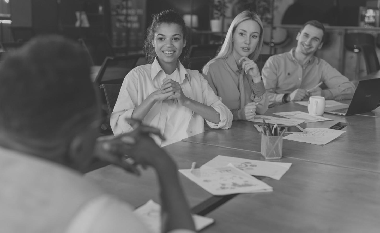 Students collaborating on interface design project in WebDevCurrent classroom